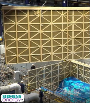 Verpackungswände werden um Anlage platziert